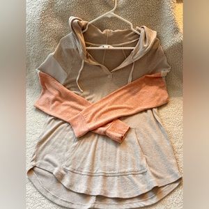 Soft lightweight hooded sweater.